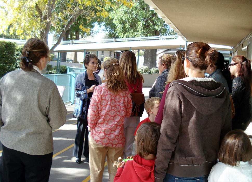 Piru parents, teachers and students listen as Fenton Charter School Director Irene Sumida explains why becoming a charter school will benefit Piru students, like it has benefited the students of their school.