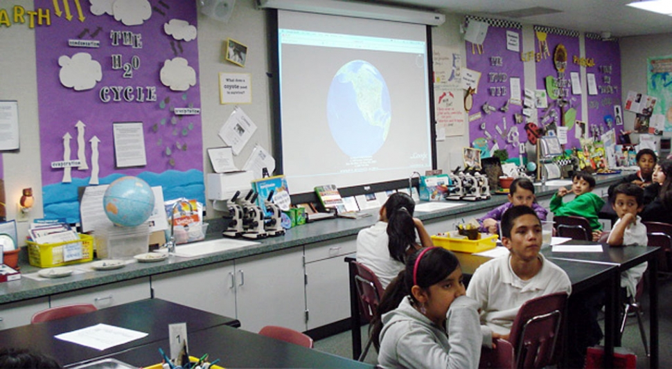 Piru visitors see Fenton Charter School's upper grade science lab, where students are learning about the geology of the sea floor.