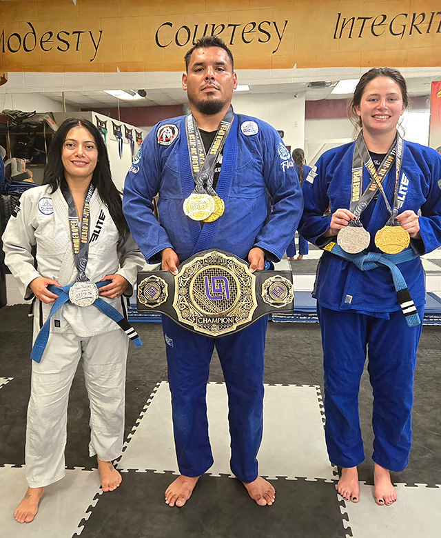 Athletes from Fillmore’s Perce’s Kenpo Karate Jiu-Jitsu team competed in Azusa and Del Mar this past weekend, earning multiple medals. Pictured (l-r) are Dayana Ramirez winning silver in Female Gi Master 1 Blue Belt; Jose Ramirez earned gold in Ultra Heavyweight Gi and No-Gi Heavyweight; and Emma Lopez won gold in Adult Female Blue Belt Gi (160+ lbs.) and silver in Adult No-Gi Open Weight. Photo credit Michael Torres.