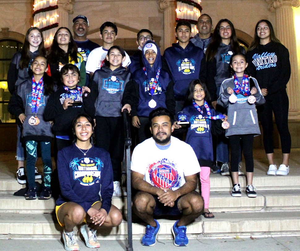 The Fillmore Condors Youth Cross Country Team which competed at the AAU Youth Cross Country Nationals in Florida on Saturday, December 5th. Top row, left to right: Leah Barragan, Yarely Herrera, Coach Felix Zuniga, Noah Flores, Diego Felix, Diego Rodriguez, Coach Phil Ramirez, Lindsey Ramirez, Yarably Herrera. Middle row, left to right: Lucy Zuniga, Natalia Retana, Santiago Felix, Abel Arana, Itzel Arana. Bottom row, left to Right: Coaches Andrea Mendez and Gerardo Flores. Photos courtesy Fillmore Condors XC President Erika Arana.