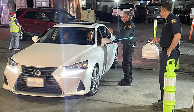 Above is from the Fillmore Fire Foundation Annual Holiday Toy Drive and BBQ Chicken Dinner Fundraiser (see page 1) for the children in the Fillmore and Piru communities. Folks took advantage of the drive-thru and picked up their dinners while others sat down and enjoyed their meal in the fire station. Toys for the Community Holiday Giveaway event on December 13 were collected during the event. Photo credit Angel Esquivel.