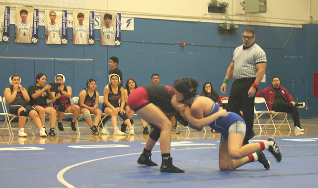 On Wednesday, January 7, Fillmore Flashes Wrestling celebrated Senior Night during their match against long-time rival Santa Paula. Above is FHS Senior Delilah Cervantez during her match against Charlie Castillo. Photo credit Jaysa Bernal Martinez.