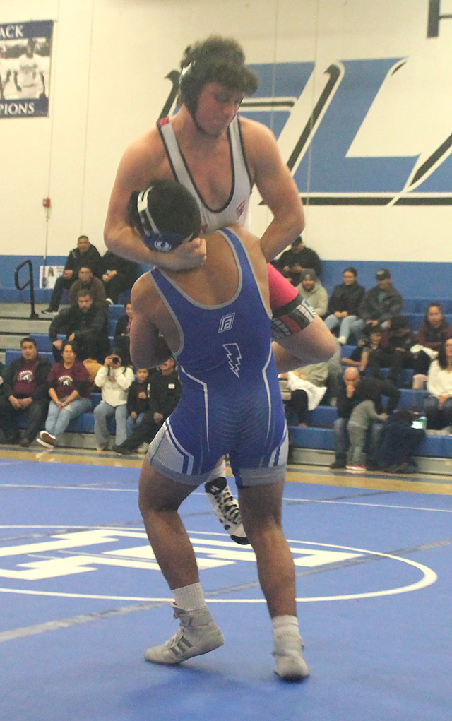 Fillmore Flashes High School wrestling hosted Santa Paula for their Senior Night and last home game of the regular season. Pictured above is Gonzalo Landeros lifting his opponent during his match against Aiden Ramirez. Photo credit Jaysa Bernal Martinez.