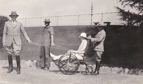 
Pictured above is Keith Spalding, left, with Eudora Hull Spalding in the wheelchair. Photo credit Fillmore Historical Museum. 
