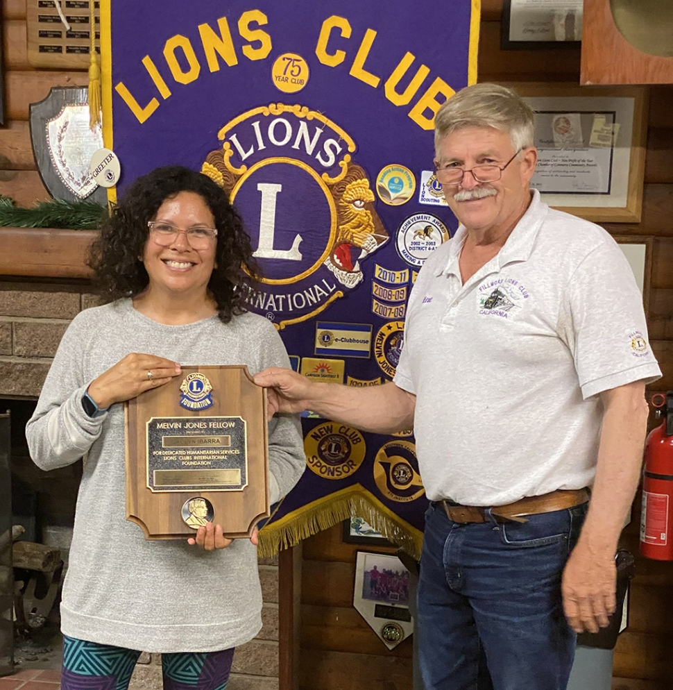 Fillmore Lions Club honored Jaclyn Ibarra, as recipient of the prestigious Melvin Jones Fellow. Mrs. Ibarra is the Fillmore
Lions Club and foundation secretary, among other hats. She was honored for her dedication and services to the community. Melvin Jones was an early pillar of Lions, also a secretary-treasurer. He was known for years of dedication and service and was for his saying, “You can’t get very far until you start doing something for somebody else. “ MJ 1920. The award was presented by Fillmore Club President Stephen McKeown. Photo credit Fillmore Lions Club.