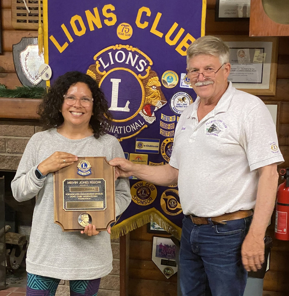 Fillmore Lions Club honored Jaclyn Ibarra, as recipient of the prestigious Melvin Jones Fellow. Mrs. Ibarra is the Fillmore
Lions Club and foundation secretary, among other hats. She was honored for her dedication and services to the community. Melvin Jones was an early pillar of Lions, also a secretary-treasurer. He was known for years of dedication and service and was for his saying, “You can’t get very far until you start doing something for somebody else. “ MJ 1920. The award was presented by Fillmore Club President Stephen McKeown. Photo credit Fillmore Lions Club.