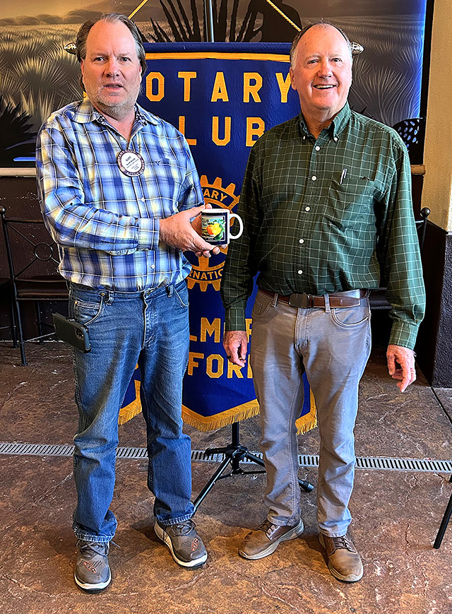Pictured is Fillmore Rotary President Scott Beylik presenting speaker Chris Brashears, who shared about Central Coast Free Vision Clinic, with a Rotary mug. Photo credit Martha Richardson.