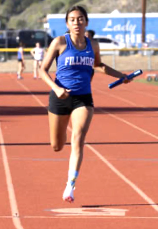 Pictured above is Flashes Junior Mia Munoz who competed in the Girls Varsity 200-meter relay and finished 9th with a time of 28.33.