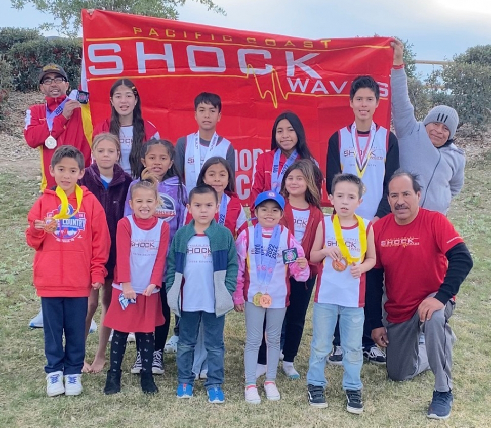 (above) The Fillmore Shockwaves Cross Country team who ended their 2022 season with two Junior Olympic Competitions. Top left: Coach Isrrael Estrada, Paola Estrada, Jorge Cruz, Niza Laureano, Jirhet Cruz, Coach Temo Laureano. Middle Left: Hanna Sassons, Aaliyah Tarango, Leah Laureano, Sarah Sasson. Bottom left: Jesus Cruz, Hilla Sasson, Abraham Saldana, Kamila Estrada, Isaac Saldana, Coach Juan Toledo. Not on picture Aniyah Hogains, Joshua Estrada, and Coach Karina Estrada. Photo & Story credit Coach Isrrael Estrada.