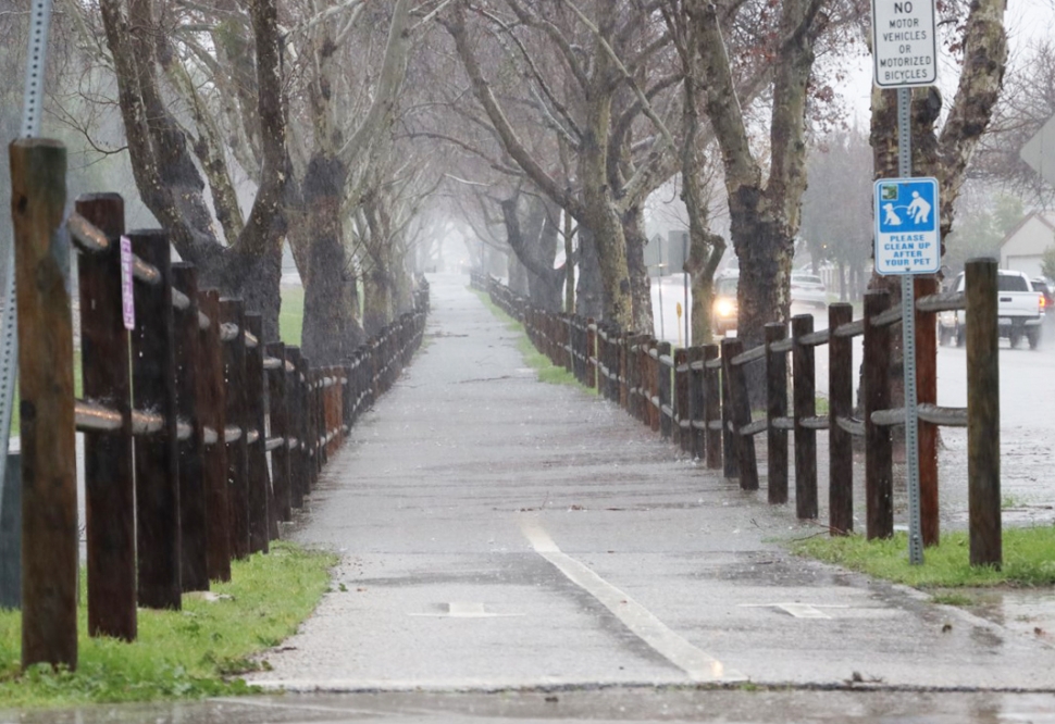 Pictured is the bike path by La Unica, off Old Telegraph Road at B Street, which was flooded Sunday afternoon. A section of B Street south of the bike path was closed due to flooding. Flooding was reported all over Fillmore, including Harthorn Lane, Foothill Drive and Casner Way. Photo credit Angel Esquivel-AE News.