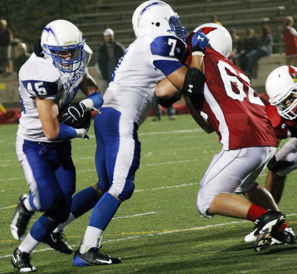 Tony Cortez #7 blocks for Matt DeLaCruz #45 against Bishop Diego. DeLaCruz had 8 carries for 69 yards, DeLaCruz also had 10 tackles, 4 of them being solo. Fillmore beat Bishop Diego 27-25.