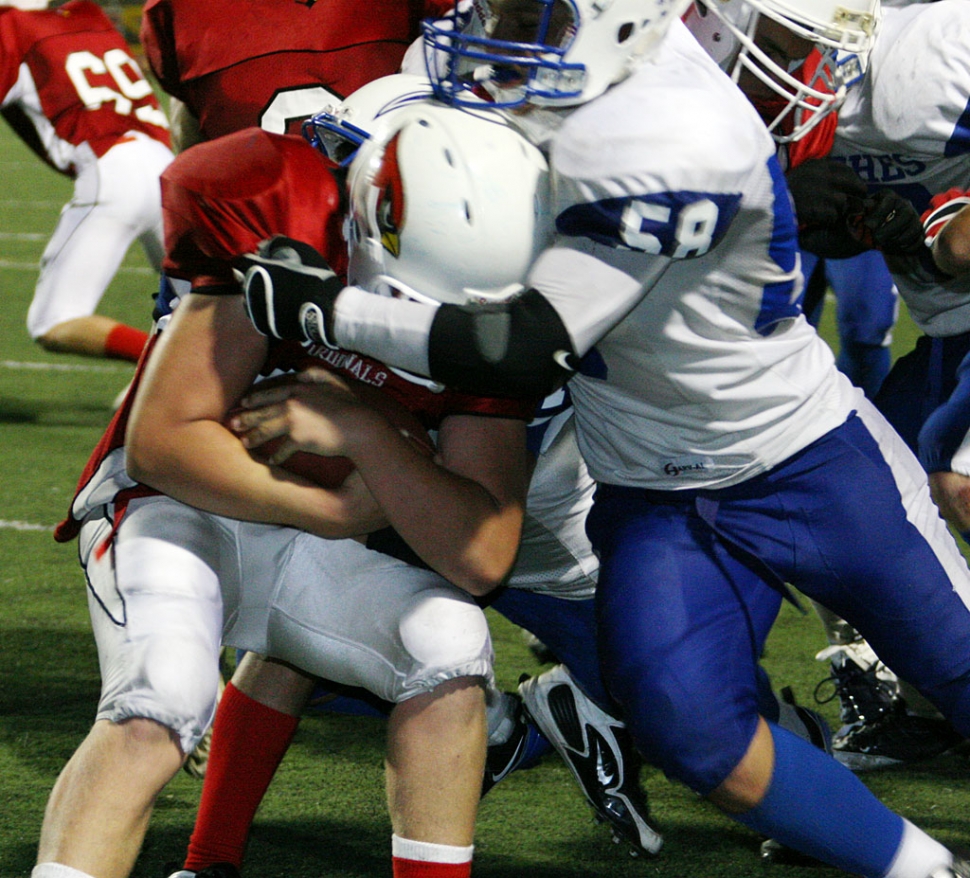 Derek Luna #58 has no problem bringing down Bishop Diego runner. According to Coach Dollar, “ It was
a good game, we came together as a team in the second half.”