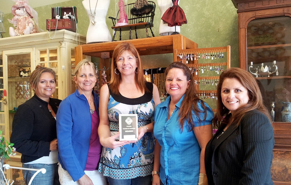 All inside the Fox & Hound Treasures & Antiques store, standing in front of Kimberly’s display of custom jewelry. (l-r) Ari Larson - Chamber Vice President, Tammy Hobson - Chamber 2nd Vice President, Kimberly Nance - Owner of Fox & Hound Treasures & Antiques, Cindy Jackson - Chamber President, and Theresa Robledo, Chamber Board Director.