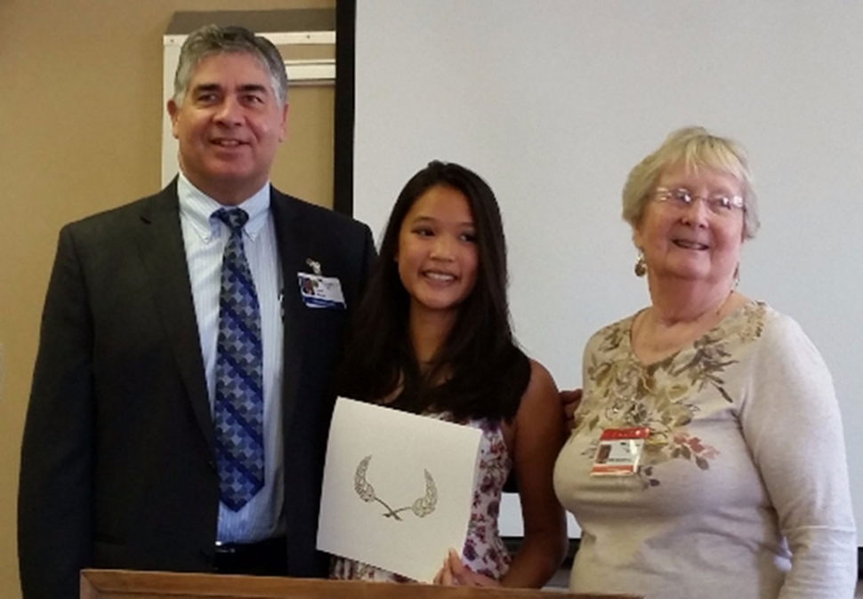 Michelle Pablo (center), with Gary Wilde, CMHS President and CEO, and CMH Auxiliary President Edie Marshall 

