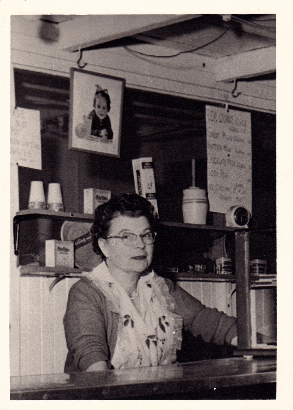 Elvira Hardison at food stand, 1955.