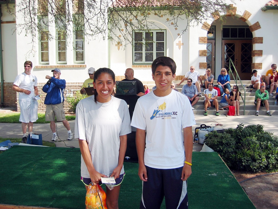 Overall Winners of 5K: Tefany Gonzalez and Adrian Mejia.