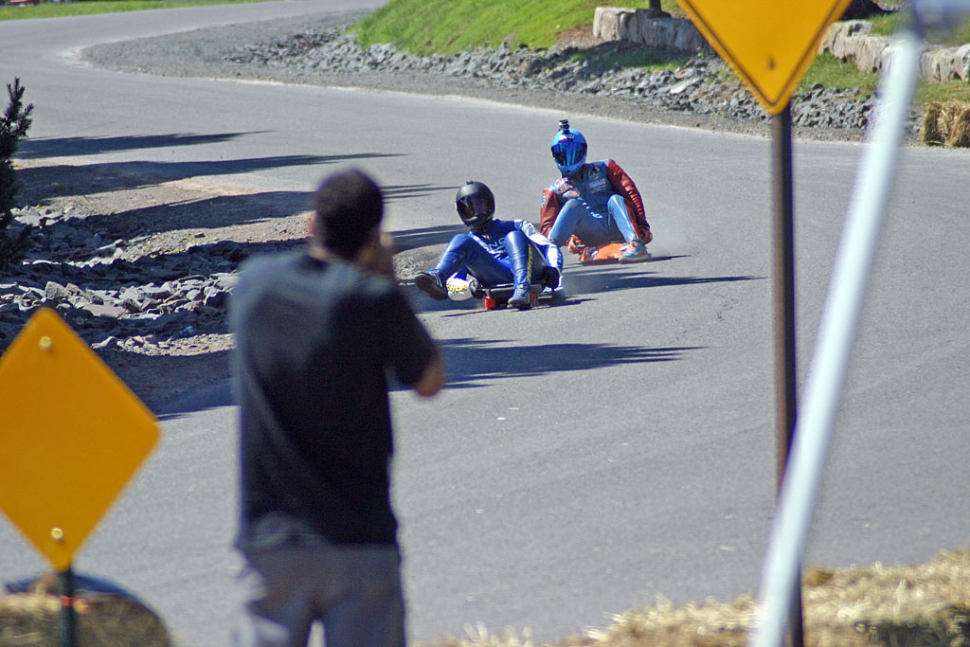 Conaway leading organizer and fellow racer Chris Hicks down the Windham race course and into Crash Corner.