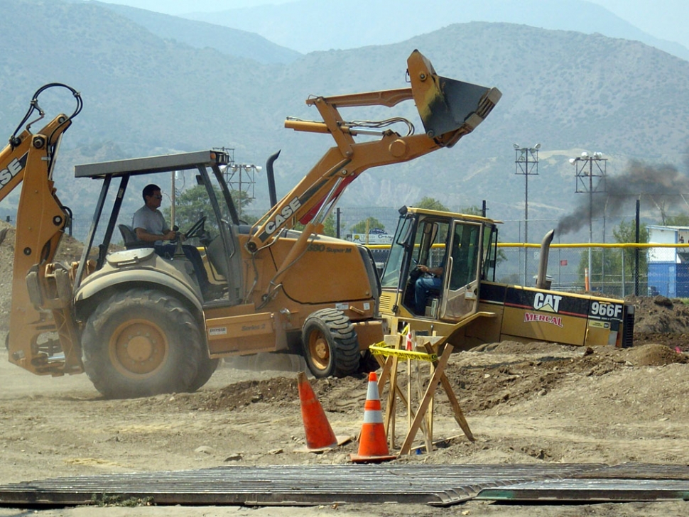 Heavy equipment work continues on the new community pool and tennis project.