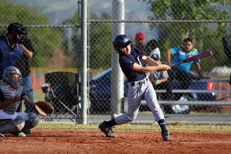 Aaron Cronin hits his second homerun of the game over the fence.