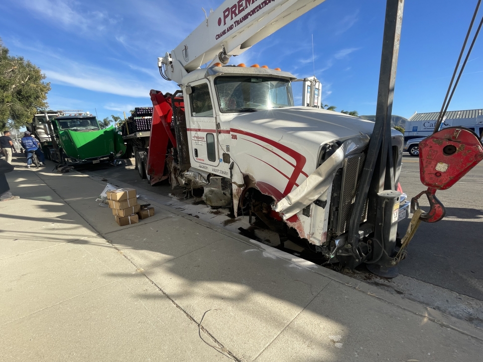 On Tuesday, October 31st, at 1:05 p.m., Fillmore Police Department, Fillmore City Firefighters, and AMR Paramedics were dispatched to a reported traffic collision in front of Bunnin Chevrolet. Arriving deputies found a loaded crane and transportation semi into a loaded semi-trailer on westbound 1000 block of Ventura Street. No injuries were reported, and the cause is under investigation. Photo credit Angel Esquivel-AE News.