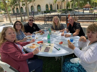 After the ceremony a BBQ dinner followed for folks to enjoy, cooked by multi-award-winning barbecue master Steve Conaway and his father Paul. Above are some folks enjoying their meal BBQ; below is Steve and his team who helped prepare the food. 