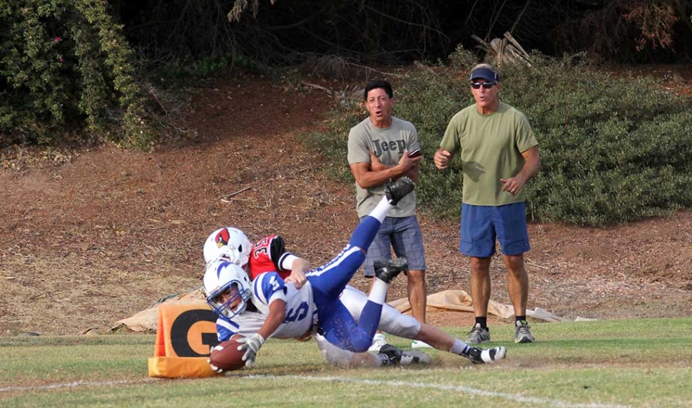 #5 Gabriel Gonzalez gets the ball into the end zone for a Fillmore touchdown. Photos by Crystal Gurrola.