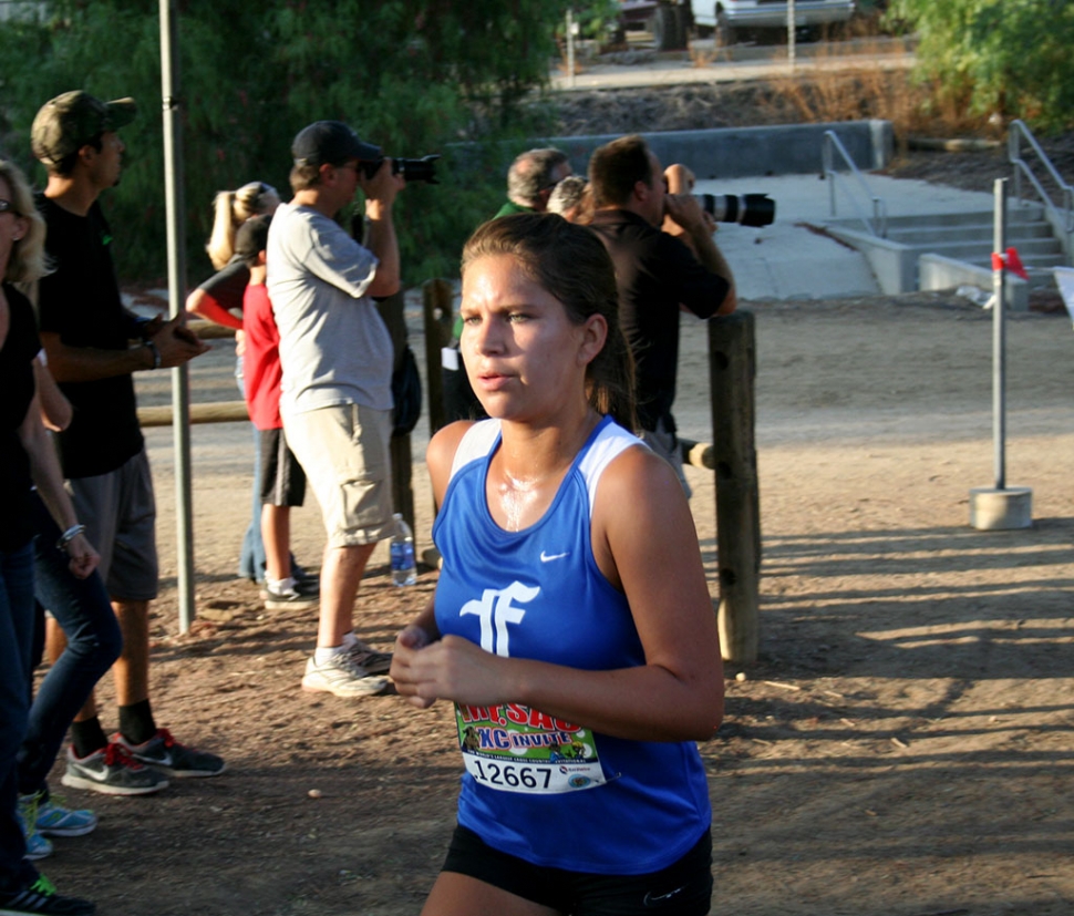 Fillmore Varsity Girl Jordyn Vassaur preparing for poop out hill at the Mt. Sac Invitational this past Saturday. Jordyn was the third Fillmore athlete for the Lady Flashes to Kiana Hope and Lupita Perez. She has been an integral part of her team's success. Her willingness to work hard in practice and in the meets has helped in pushing her team forward in the right direction. Keep up the good work Jordyn, your coaches and teammates are proud of you.