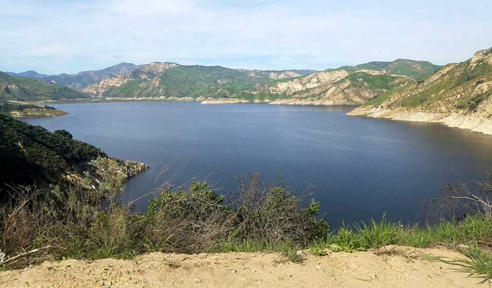 “U.S. Department of the Interior Fish and Wildlife Service Funds to Provide Full-Time Seasonal Staff at Lake Piru to Focus on Outbound Vessel Inspections and Decontamination Efforts.” Photo of Lake Piru taken March 2017.