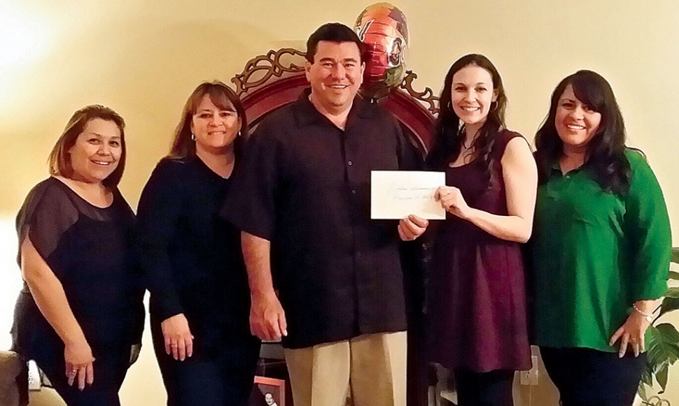 Francisco Vazquez, owner of FV Drafting Services is pictured with Chamber of Commerce members Irma Magana, his wife Linda Vazquez, Ranea Stovesand-Martel, and Maura Gomez.