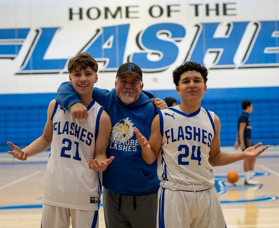 Pictured is Flashes #21 Jack Morris, named MVP for the Citrus Coast League, FHS Varsity Basketball Coach Mark Blankenship, named Coach of the Year, and #24 Jacob “Archie” Munoz, named Citrus Coast League Honorable Mention.