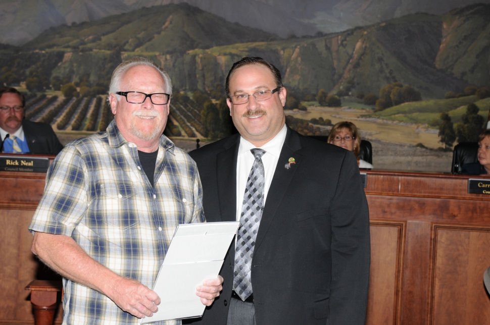 Rusty Cochran, owner of Grimes Rock Inc., who donated $9,832 worth of soil for the Pump Track Park, receives a
Proclamation from Mayor Douglas Tucker.