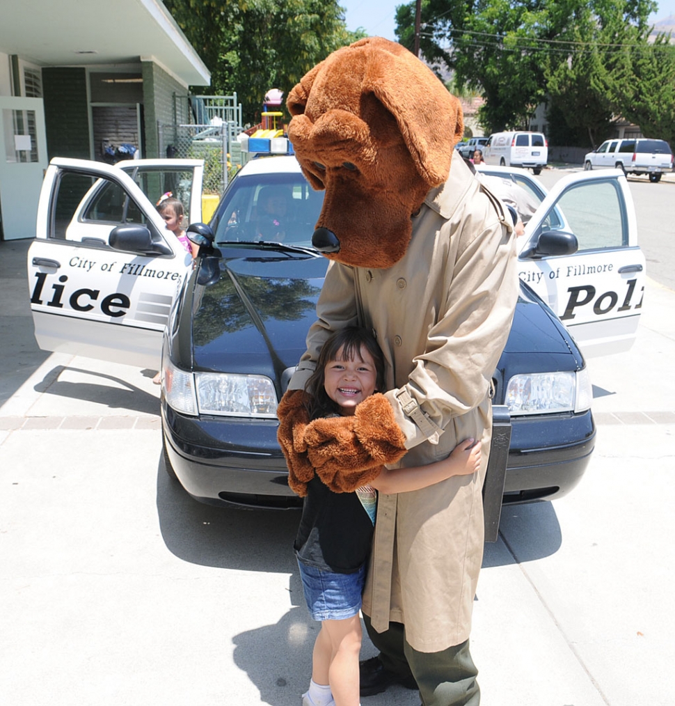 McGruff, the Crime Dog, visited students at Sespe Elementary last week. He is part of the Ad Council for the National Crime Prevention Council for use by American police in building crime awareness among children. McGuff’s motto is “Take a Bite out of Crime”. He visits schools talking about drugs, bullying safety and the importance of staying is school. The students gave McGruff lots of hugs, and took turns sitting in the police car.