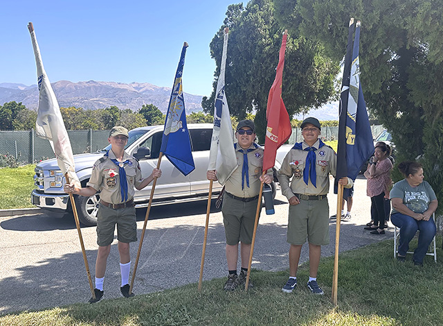 Above are Fillmore’s Boy Scout Troop 406 holding flags representing the five branches of the military. The troop, as well as Cub Scout Troop 3400, helped with the Pledge of Allegiance during the Memorial Day ceremony. Photo credit Gazette Staff.