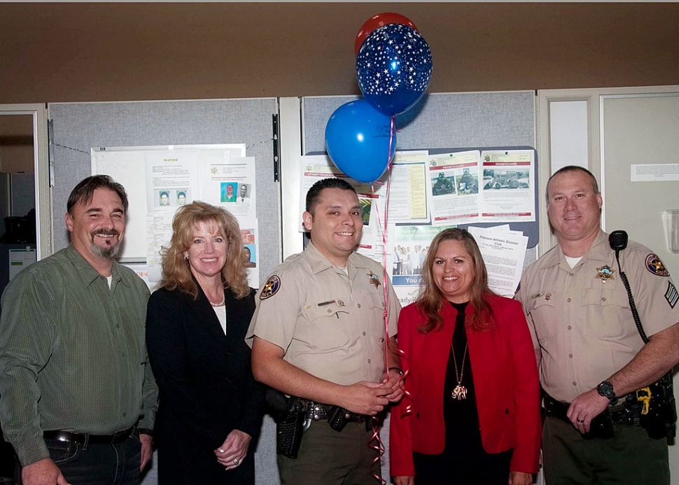 (l-r) Eric Vigal, Captain Monica McGrath, Police Officer of the Year Gabe Gonzales, Ari Larson, and Sgt. Smith.