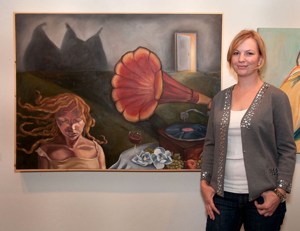 Ashleigh Norman of Fillmore with her award winning painting, "The Message." Photo by Myrna Cambianica.