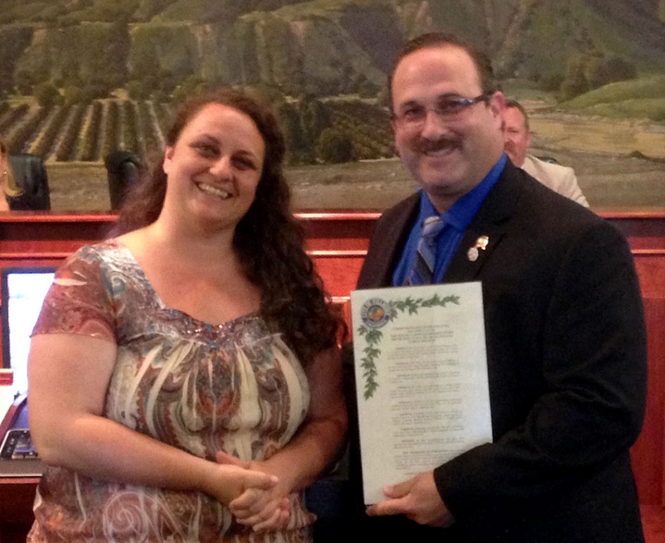 Kate English, newly appointed Executive Director of One Step a la Vez, receives a Proclamation from Mayor Douglas Tucker and the City of Fillmore for the Ventura County El Concilio Latino Leadership Award for outstanding service to youth granted to the One Step a la Vez Program.