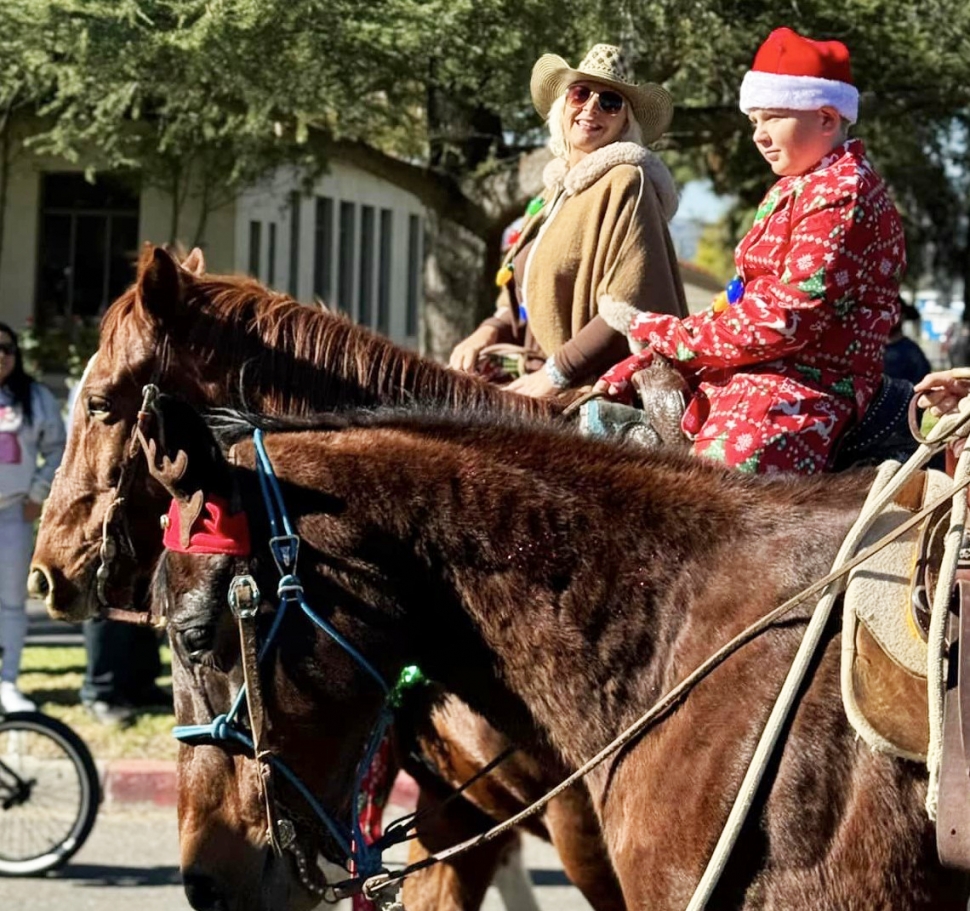 Pictured are Heather and Emmett Swetman riding in the Lions Club Christmas Parade. 
Photo credit Brandy Hollis.
