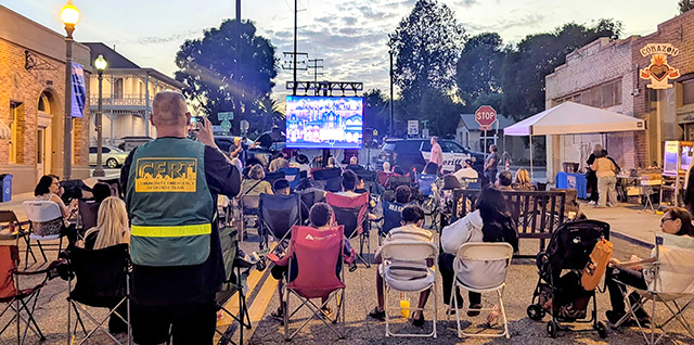On Saturday, August 29, the Piru community gathered on Center Street for a special viewing event of Warner Bros.’ Lanterns, the new series that filmed in Piru in 2025 and transformed portions of the town’s downtown area into a filming location. Community members came together to watch episodes 1 and 2 of the series. The event was sponsored by the Piru Neighborhood Council. Photo credit Piru Neighborhood Council.