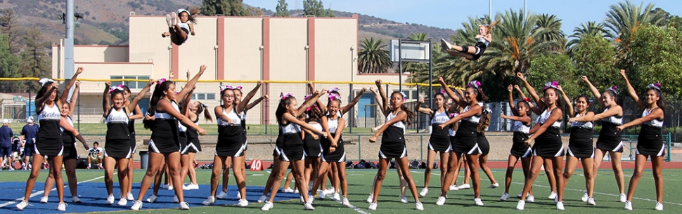 Jr.2 and Jr. 1 Raiders Cheer perform together