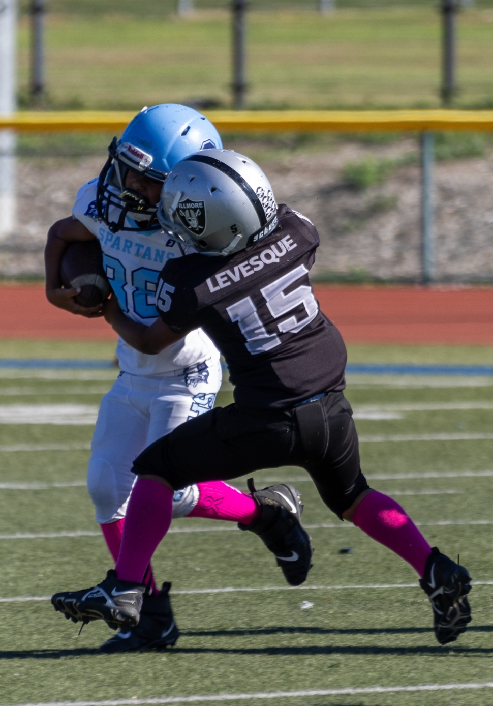 Above is Raiders Bantams #15 taking down a Spartans player is last Saturday’s game. Photo credit Crystal Gurrola. 