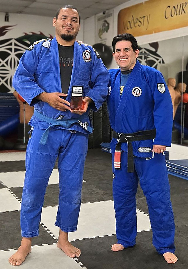 Pictured is Jose Ramirez with Coach Torres. Story and photo credit Coach Michael Torres & Silverio Garcia.