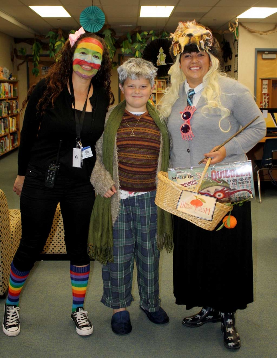 Last week at Mountain Vista Elementary School celebrated Read Across America Program celebrated Dr. Suess’ birthday. The school along with other school across the US held a dress up days for the entire week, and on Friday, March 9th the Mountain Vista Principal and students dress as their favorite Dr. Suess book character. Pictured right is Mountain Vista principal a Mountain Vista student in Stripes with Harry Potter fanatics and the school librarian smiling for a photo. Picture below is Fillmore Unified School District Superintendent Adrian Palazuelos who read to the some of the students at Mountain Vista to celebrate Dr. Suess’ Birthday. Photos Courtesy Loriann Boon, Kelly Myers, and Sandra Cano Mountain Vista Elementary School Principal.