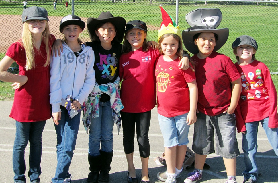 Fourth Grade students Shelby Smith, Erin Berrington, Ariana Schieferle, Natalie Couse, Keyanna Stehly, Alejandro Rojas, Matt Van de Meen showing their school spirit by participating in Red Ribbon Week activities.