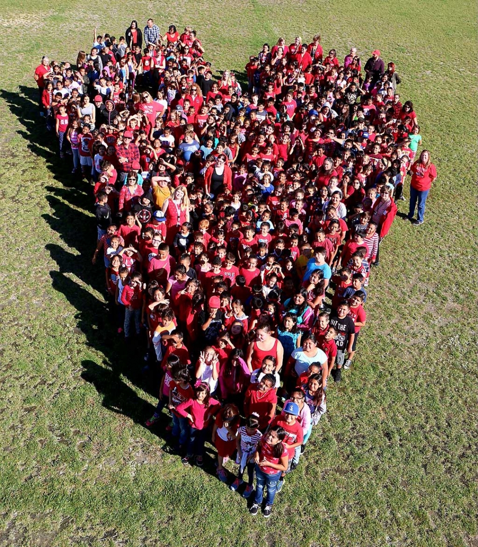 Rio Mesa School is celebrating Red Ribbon Week all the students and teachers form together a giant heart.