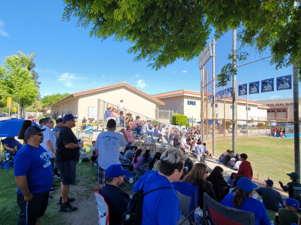 On Friday, May 12, Fillmore Flashes Baseball team defeated Artesia High School in the Division 7 CIF Quarter-Finals, score 7 – 1. This advanced the Flashes to the Semi-Final game at home against Cantwell-Sacred Heart of Mary on Tuesday, May 16, and defeated them 4 – 1. Above are the Flashes after a big win, they have now advanced to the  championship game set for Friday, May 19, against Ganesha High School time and location TBA. For updates visit https://www.maxpreps.com/ca/fillmore/fillmore-flashes/baseball/schedule/