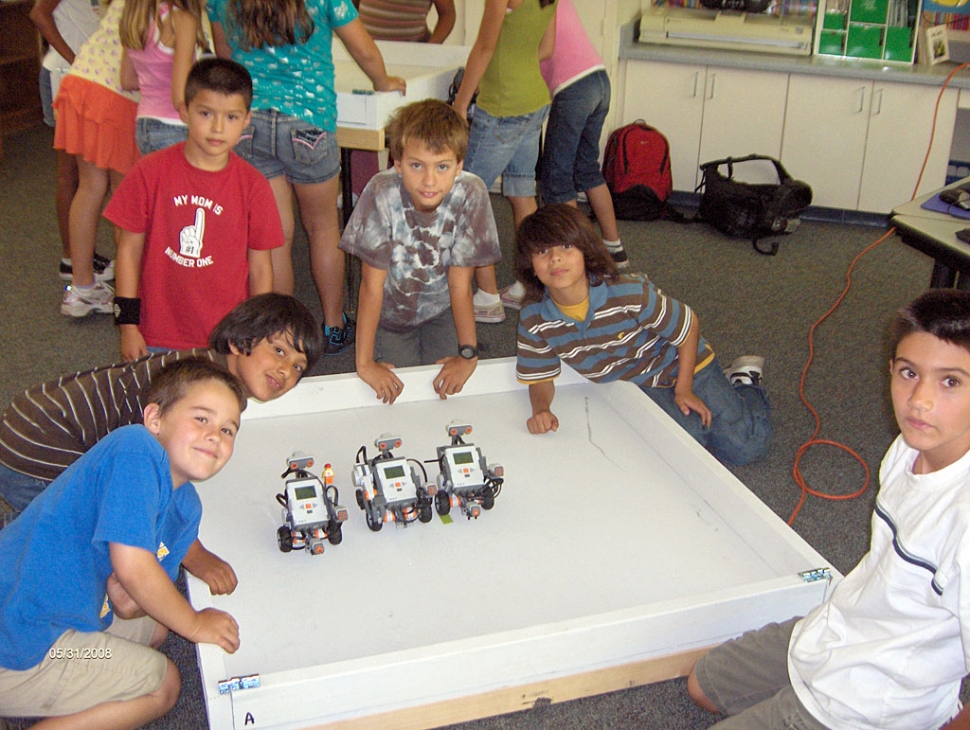 Mrs. Walker's 4th grade students working with robotics.