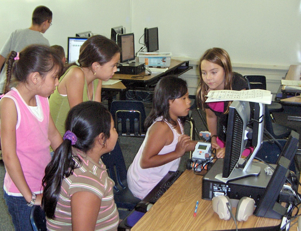 Mrs. Walker's 4th grade students working with robotics.