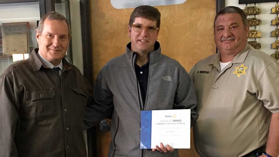 Fillmore Rotary Recognize Member Sean Morris. Kyle Wilson (left) pictured with Dave Wareham (right) presenting Sean Morris the “Avenues of Service Citation Award.” Sean was recognized as being an outstanding Rotary member in Club Service, Vocational Service, Community Service, International Service and Youth Service. Sean is a fine example to the all club members. Photo courtesy Martha Richardson.