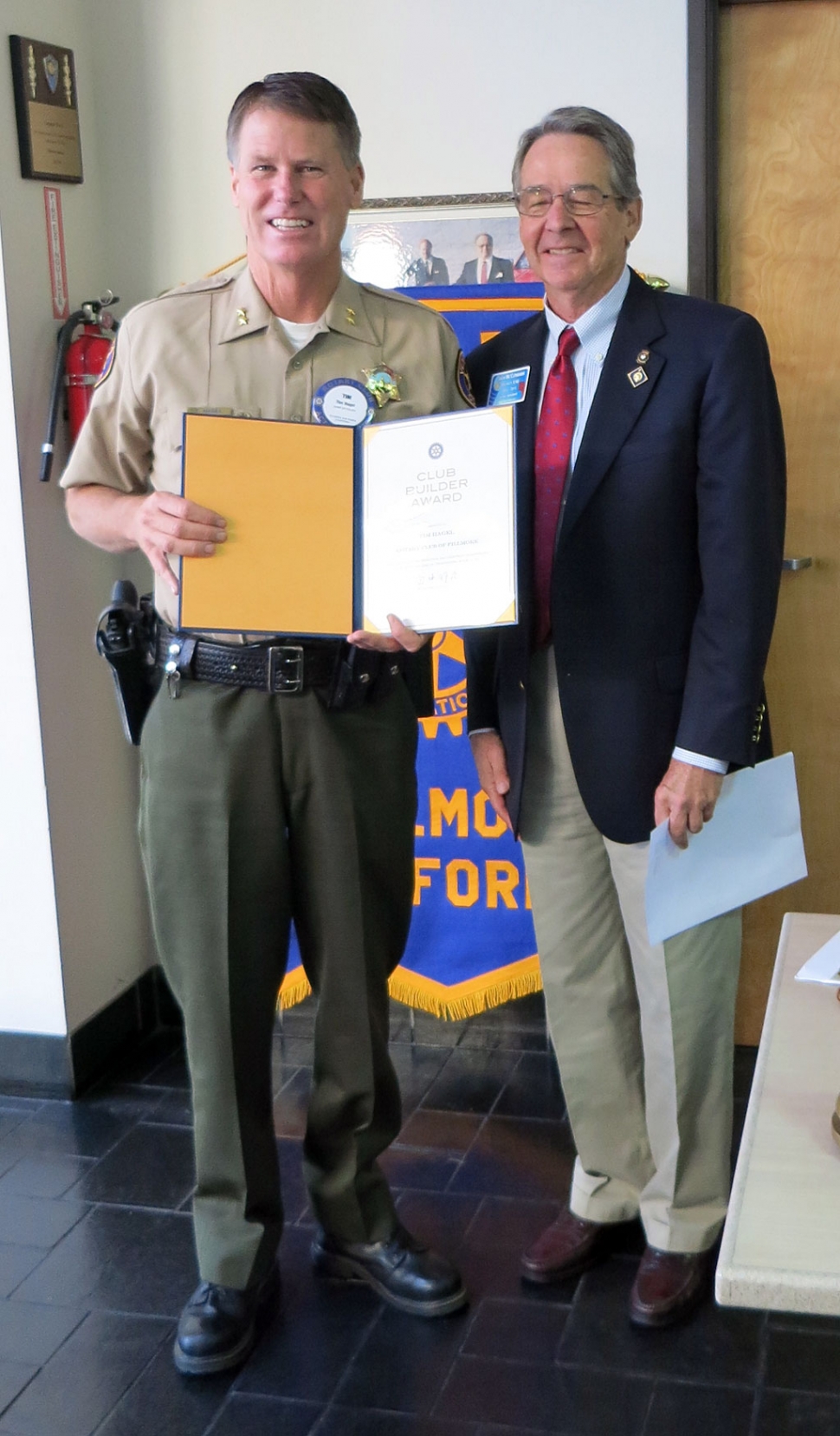 District Governor, Jack McClenahan presented Tim Hagel with the District Club Builder Award for his part in the merger of the two Fillmore Rotary Clubs.