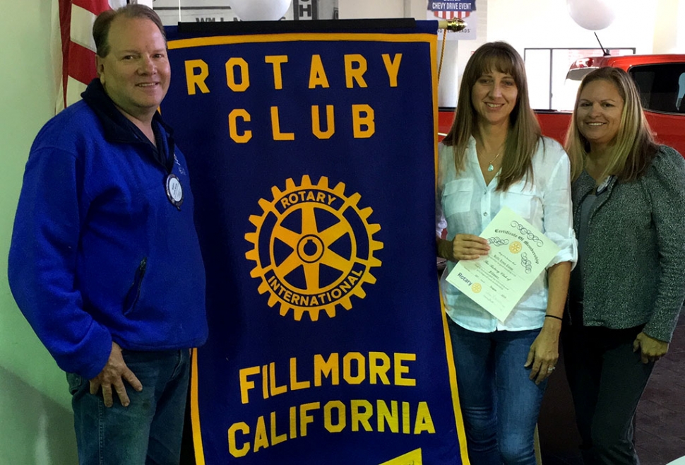During a special ceremony Rotary Club President Ari Larson and Sponsor Scott Beylik inducted Kelli Couse into the Rotary Club of Fillmore. Photo Courtesy Martha Richardson.